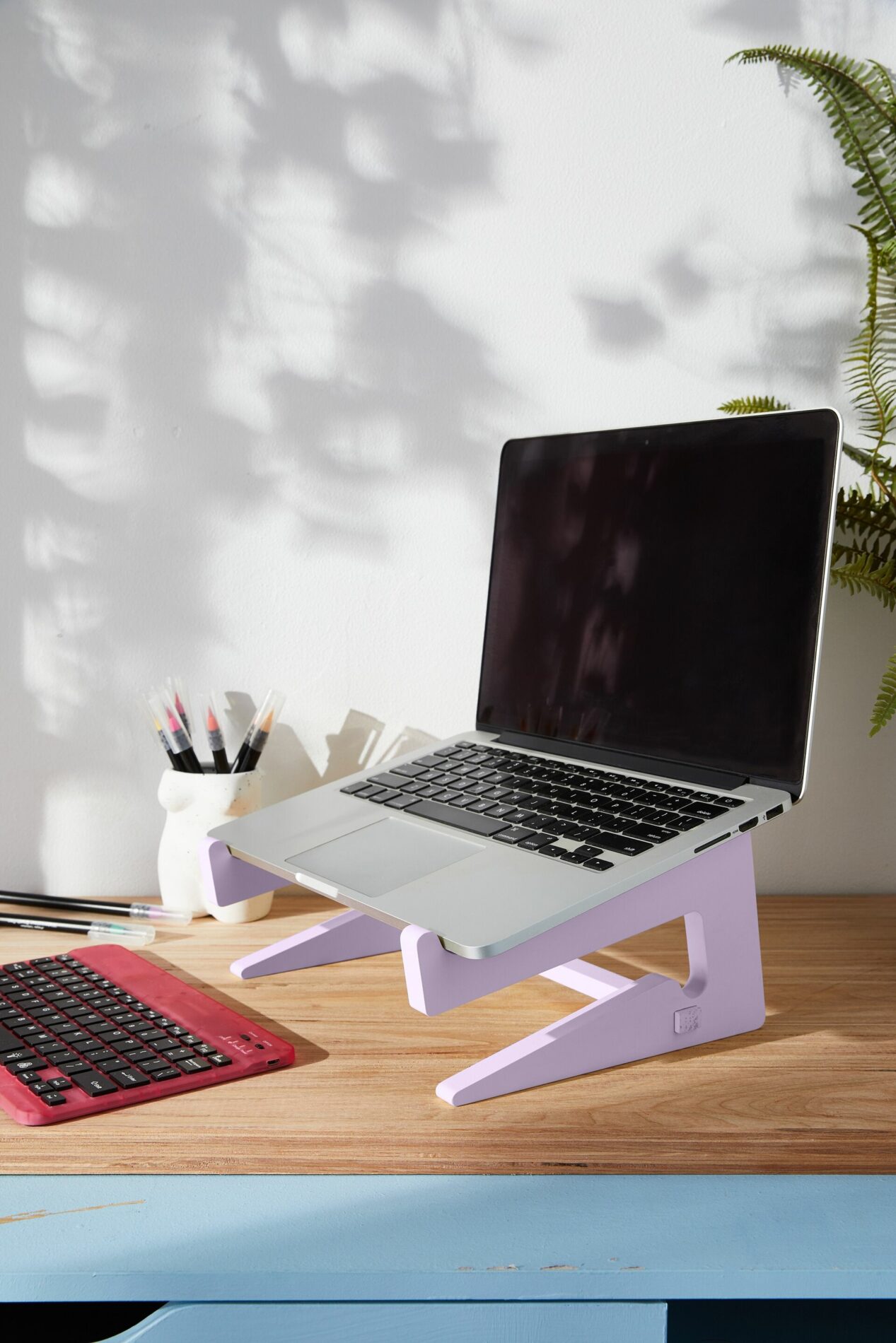 Typo laptop stand