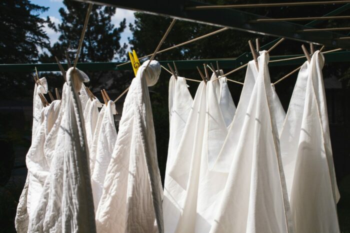 Sheets hanging outside drying on line - how often should you change your sheets