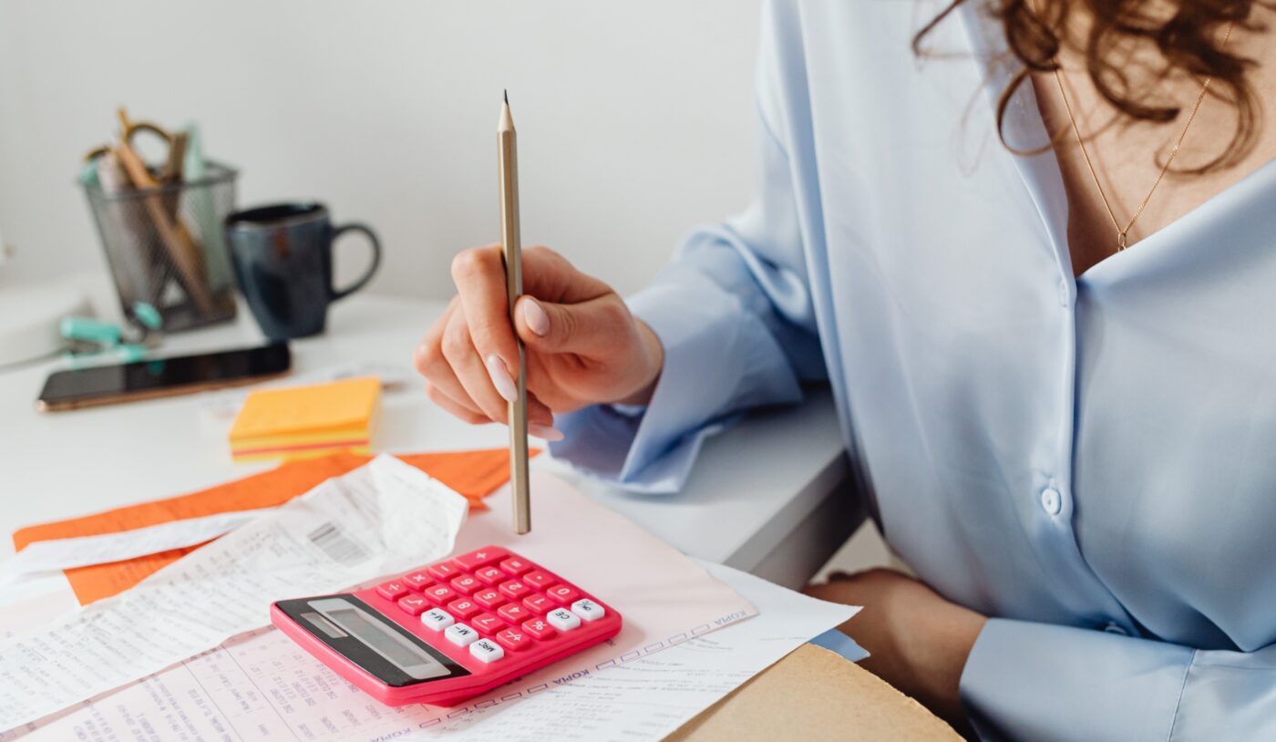 best student bills company - lady with calculator