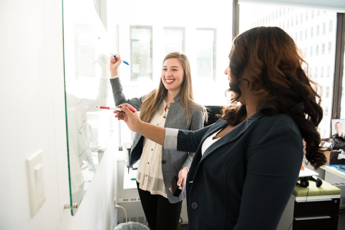 pexels-christina-morillo-1181533.jpg students writing on whiteboard - minimum maintenance loan