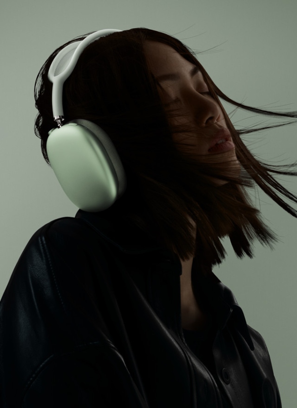woman with headphones and short dark hair